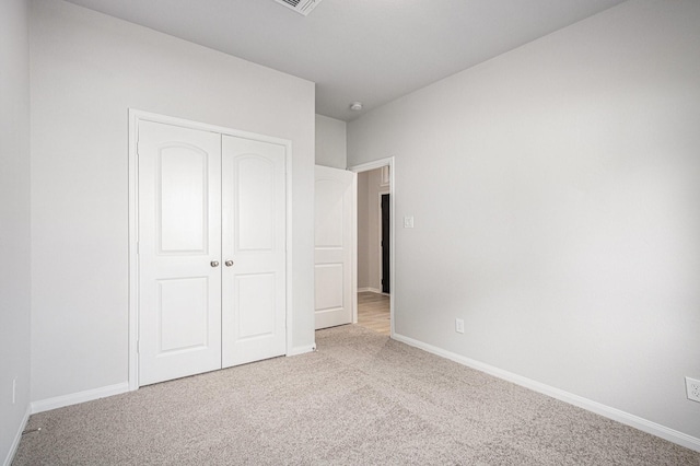 314 Wellshire Dr, West Columbia, TX 77486 - unfurnished bedroom with carpet floors and a closet