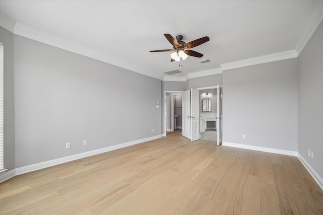 unfurnished bedroom with light wood finished floors, visible vents, baseboards, ensuite bath, and ornamental molding