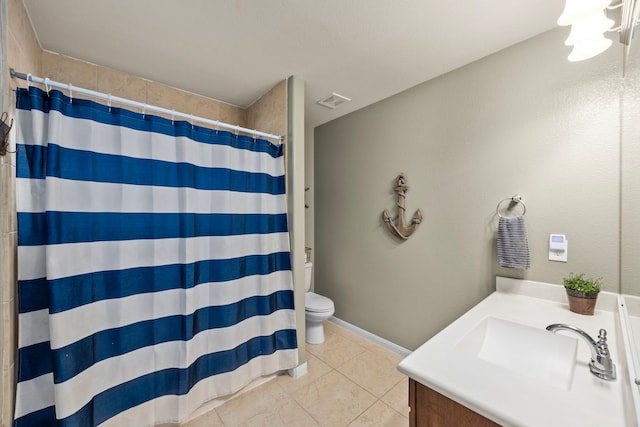 bathroom featuring toilet, a shower with shower curtain, tile patterned flooring, and vanity