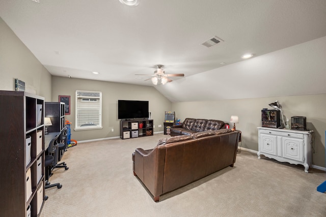 living area featuring lofted ceiling, light carpet, visible vents, and baseboards