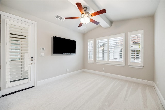 unfurnished living room featuring light colored carpet, visible vents, vaulted ceiling with beams, and baseboards