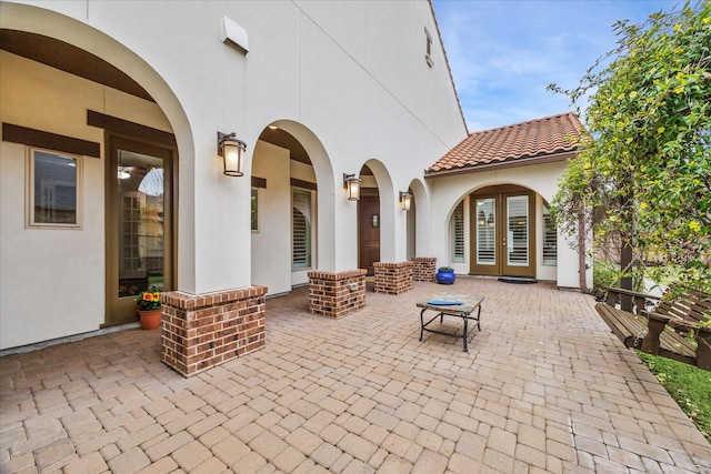 view of patio / terrace featuring french doors