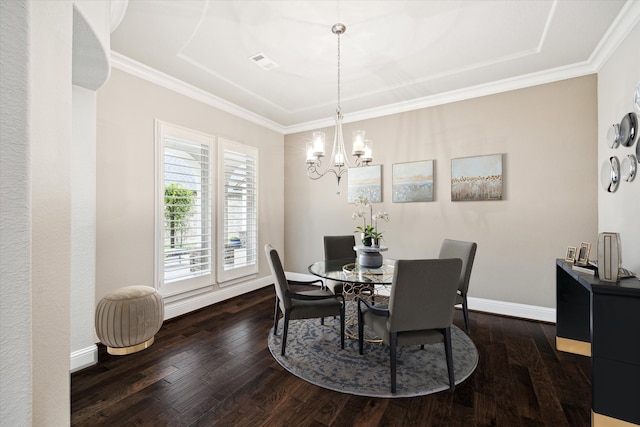 dining space with baseboards, visible vents, ornamental molding, dark wood-style flooring, and a notable chandelier