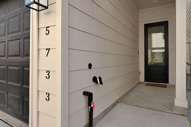 entrance to property with a garage