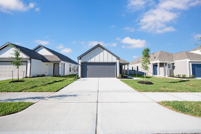 8106 Vanilla Orchid Dr, Houston, TX 77016 - modern farmhouse style home with a front yard and board and batten siding