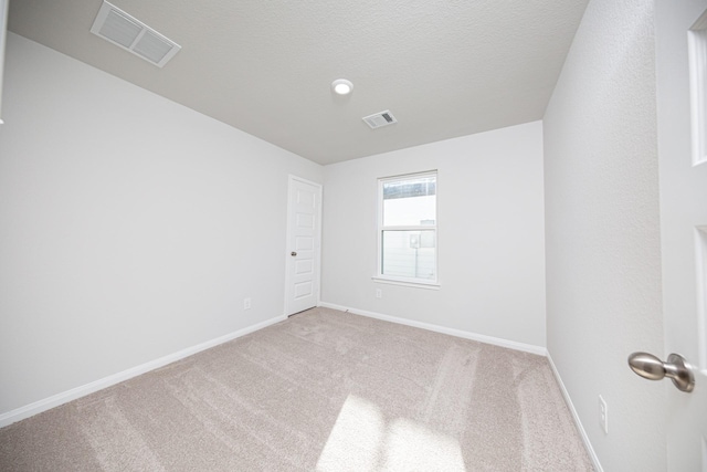 8106 Vanilla Orchid Dr, Houston, TX 77016 - empty room featuring carpet flooring, visible vents, and baseboards