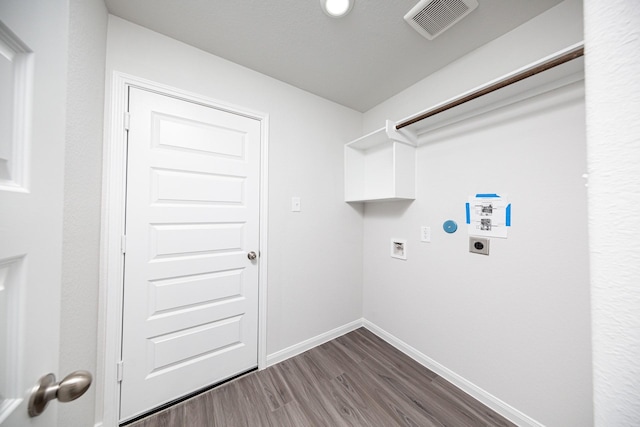 8106 Vanilla Orchid Dr, Houston, TX 77016 - laundry area featuring laundry area, electric dryer hookup, visible vents, washer hookup, and dark wood-style floors