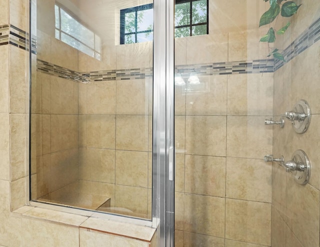 full bath featuring a stall shower