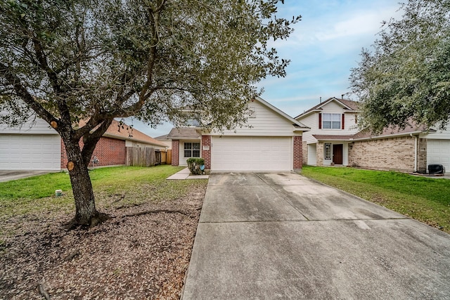 traditional-style house featuring a front yard, brick siding, driveway, and an attached garage