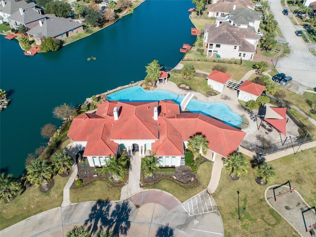 aerial view with a water view and a residential view