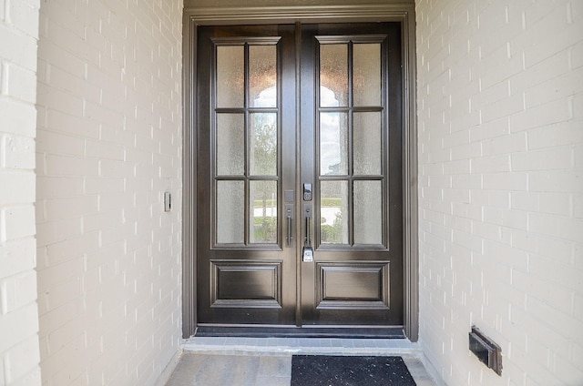 doorway to property featuring french doors