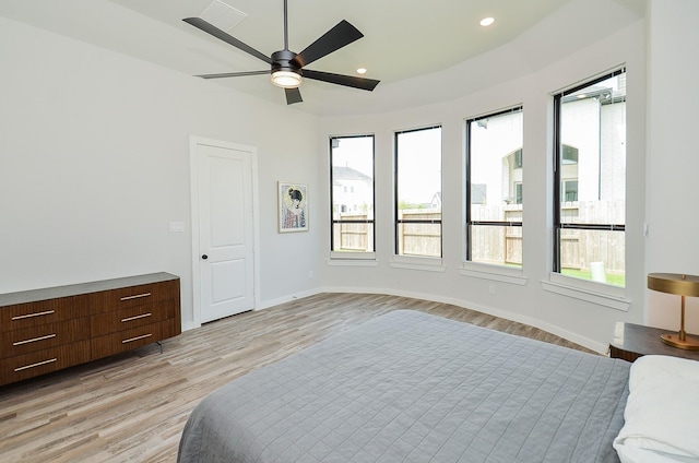 bedroom featuring recessed lighting, baseboards, light wood-style floors, and ceiling fan