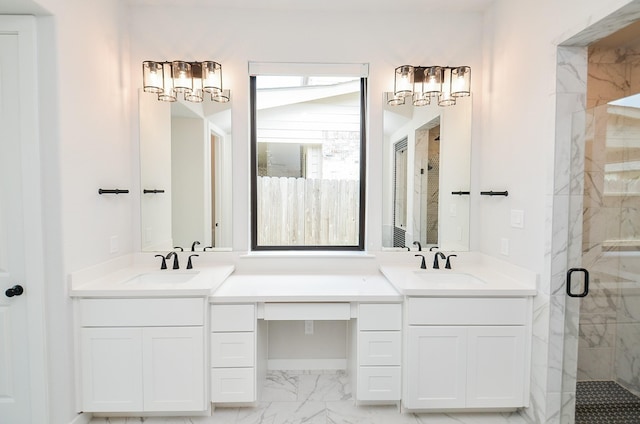 bathroom with a sink, a marble finish shower, marble finish floor, and double vanity