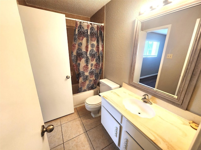 full bath featuring vanity, shower / bath combo with shower curtain, toilet, a textured ceiling, and tile patterned floors