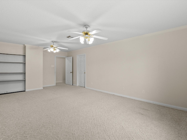 empty room featuring visible vents, baseboards, ceiling fan, and carpet flooring