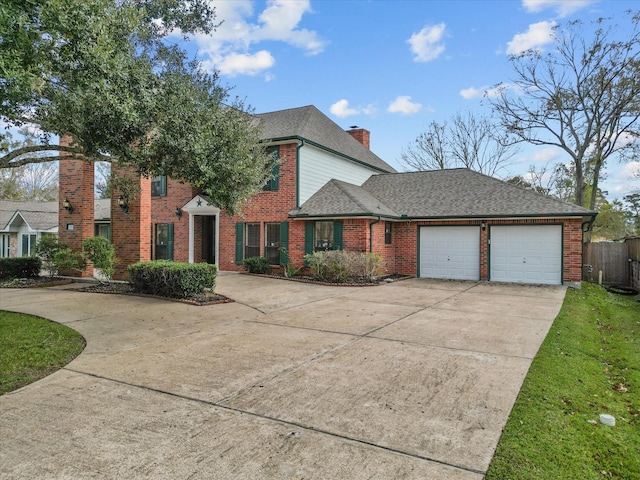 view of front facade with driveway, brick siding, a chimney, and an attached garage