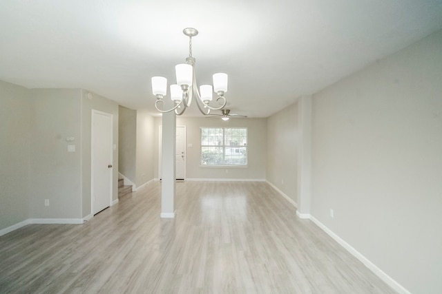 unfurnished dining area with light wood-type flooring, stairs, and baseboards