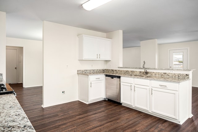 kitchen featuring a sink, light stone countertops, white cabinetry, and stainless steel dishwasher