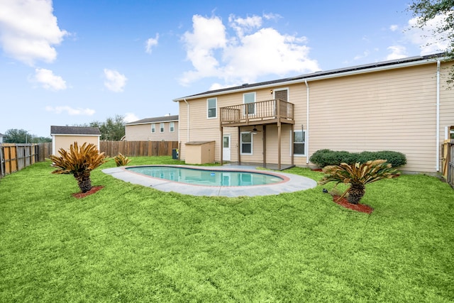 exterior space with a lawn, a fenced backyard, and a fenced in pool