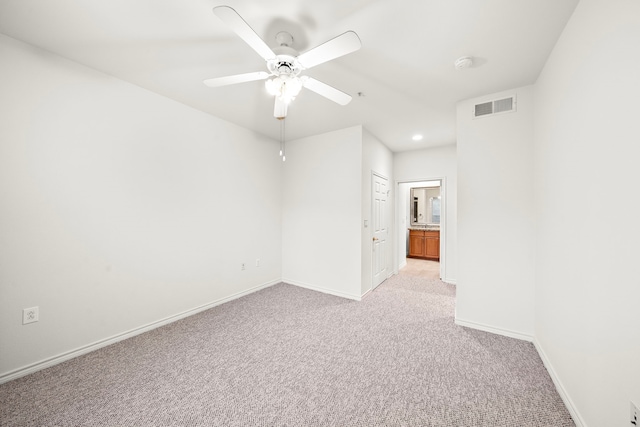 empty room with light carpet, baseboards, visible vents, ceiling fan, and recessed lighting