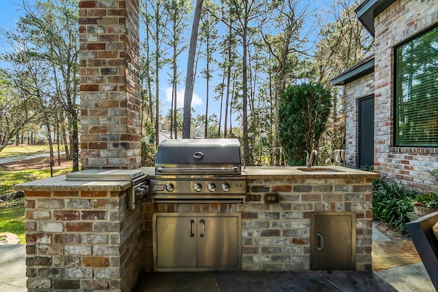 view of patio featuring a grill and area for grilling