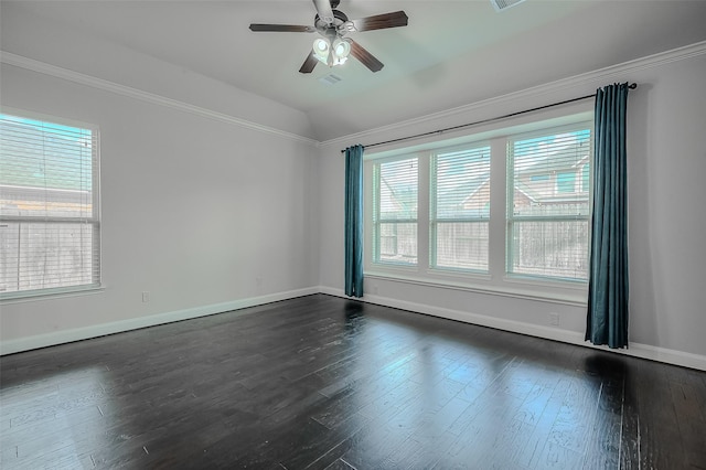 empty room featuring dark wood-style flooring, lofted ceiling, visible vents, a ceiling fan, and baseboards