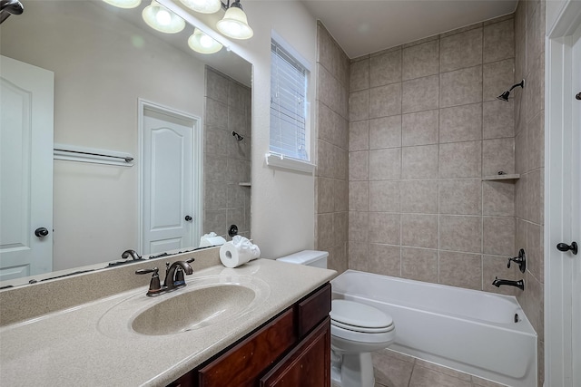 full bathroom featuring  shower combination, vanity, toilet, and tile patterned floors