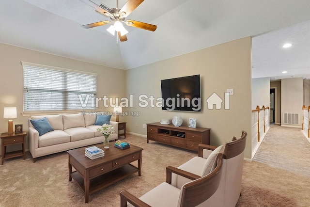 living area featuring recessed lighting, light colored carpet, visible vents, a ceiling fan, and vaulted ceiling