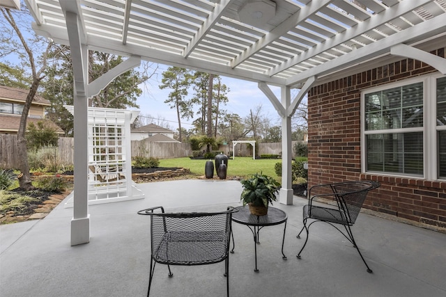 view of patio with a fenced backyard and a pergola