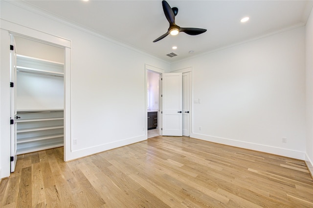 unfurnished bedroom featuring recessed lighting, visible vents, ornamental molding, light wood-style floors, and baseboards