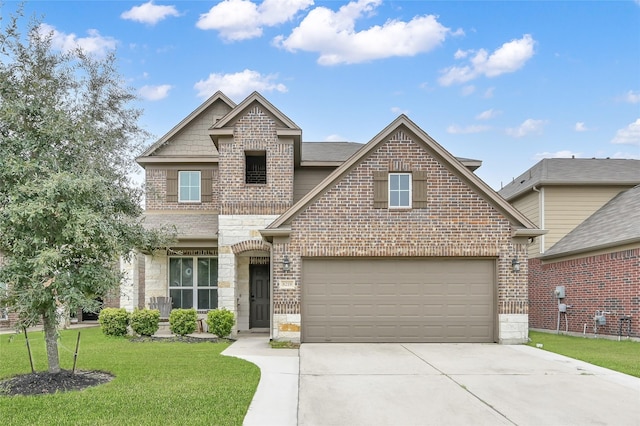 craftsman-style house with driveway, brick siding, a front yard, and stone siding