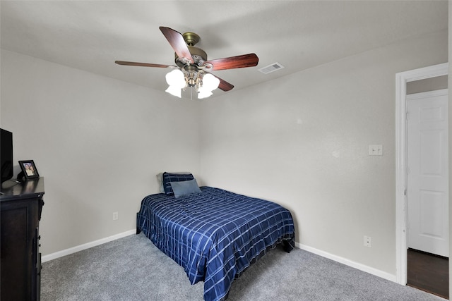 bedroom featuring baseboards, visible vents, and dark carpet