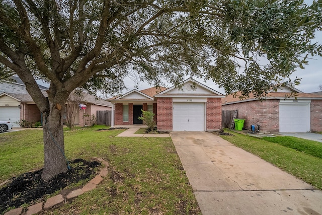 ranch-style house featuring a garage, brick siding, fence, driveway, and a front yard