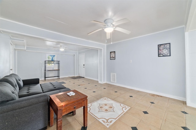 tiled living area featuring visible vents, ornamental molding, a ceiling fan, and baseboards