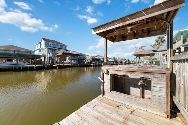 dock area with a water view