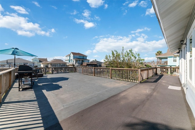 view of patio / terrace featuring a residential view and area for grilling