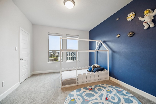 9410 Knollwood Ln, Missouri City, TX 77459 - carpeted bedroom featuring baseboards