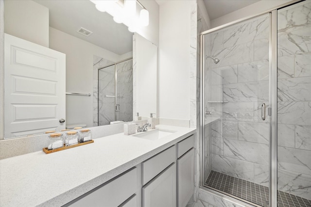 9410 Knollwood Ln, Missouri City, TX 77459 - bathroom with a marble finish shower, visible vents, toilet, marble finish floor, and vanity