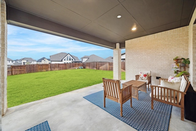 9410 Knollwood Ln, Missouri City, TX 77459 - view of patio featuring a residential view and a fenced backyard