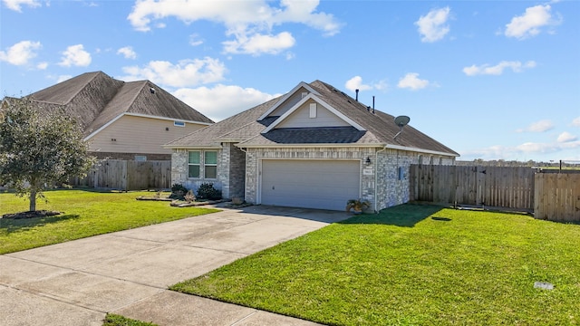 view of front of property featuring an attached garage, a shingled roof, fence, driveway, and a front lawn