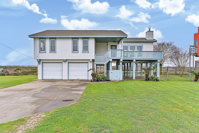 view of front of home with a chimney, concrete driveway, stairway, an attached garage, and a front yard