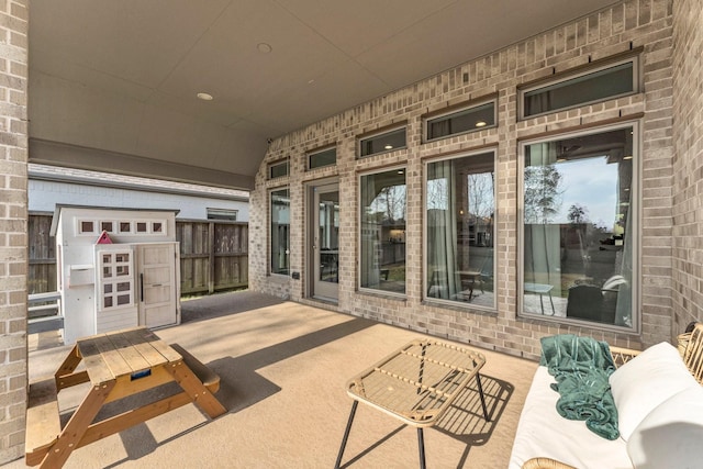 view of patio / terrace with fence