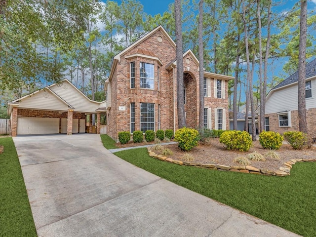 view of front facade featuring a garage, concrete driveway, brick siding, and a front lawn