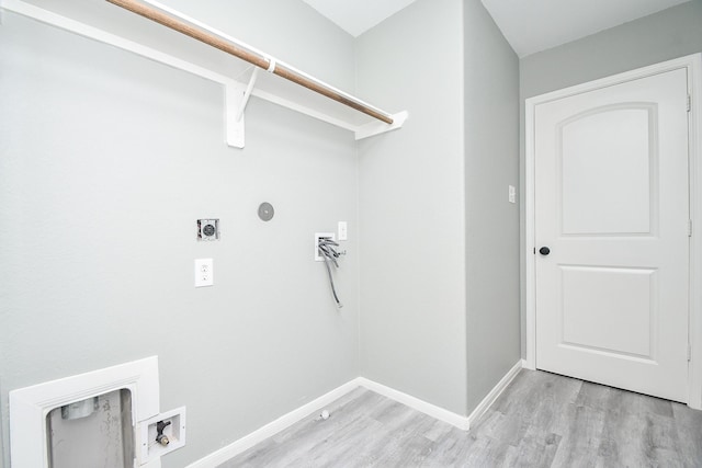 washroom featuring hookup for a washing machine, laundry area, electric dryer hookup, and light wood finished floors