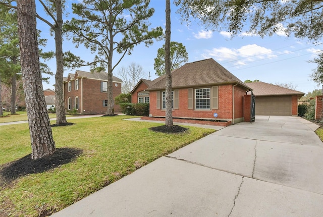 view of front of home featuring a garage, roof with shingles, a front yard, and brick siding