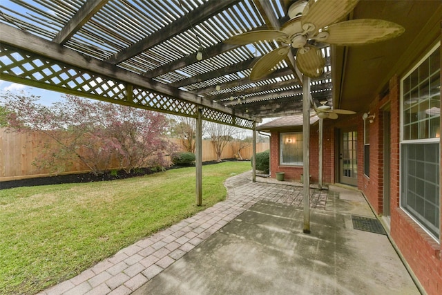 view of patio featuring a fenced backyard, ceiling fan, and a pergola