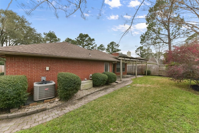 view of property exterior with central air condition unit, fence, a pergola, and a lawn