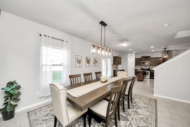 dining room with recessed lighting, baseboards, visible vents, and light tile patterned flooring