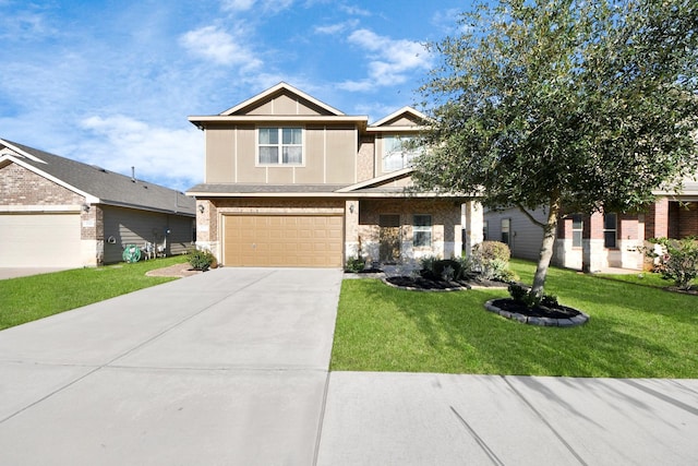 craftsman inspired home with a garage, brick siding, driveway, and a front lawn