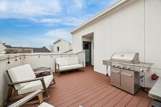 wooden terrace with area for grilling